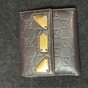 Gucci Embossed Brown Card Holder with Gold Accents